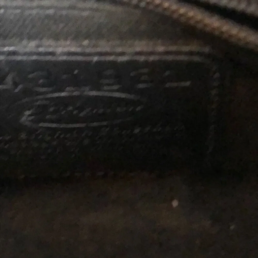 Brighton Pebbled leather handbag with heart detail brown black